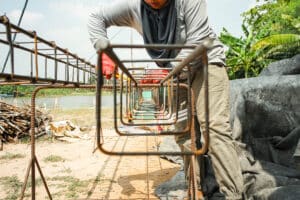 man preparing steelwork for concrete column