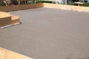 curing of newly poured concrete