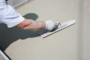 max fixing a concrete surface - Big Easy Concrete Covington